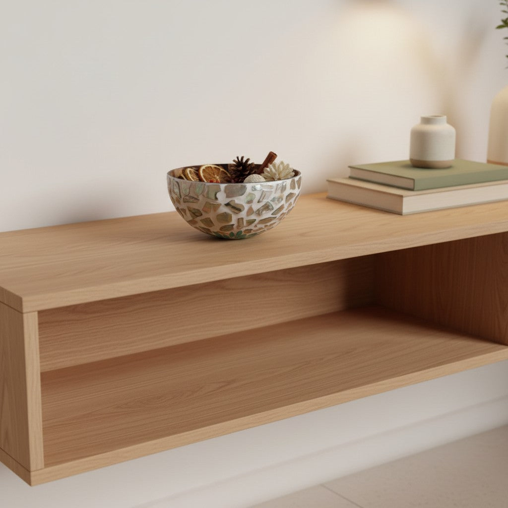 Aqua Bloom Coconut Bowl styled on a wooden shelf in a neutral home setting