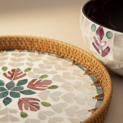 Blush Leaf round tray with matching coconut bowl showing rattan rim and mother-of-pearl detailing