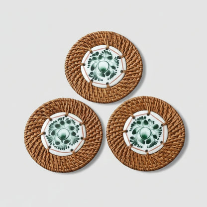 Set of 3 Dark Lotus ceramic coasters wrapped in handwoven rattan — lotus design