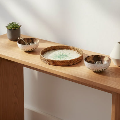 Emerald Petal tray and coconut bowls styled on a console table