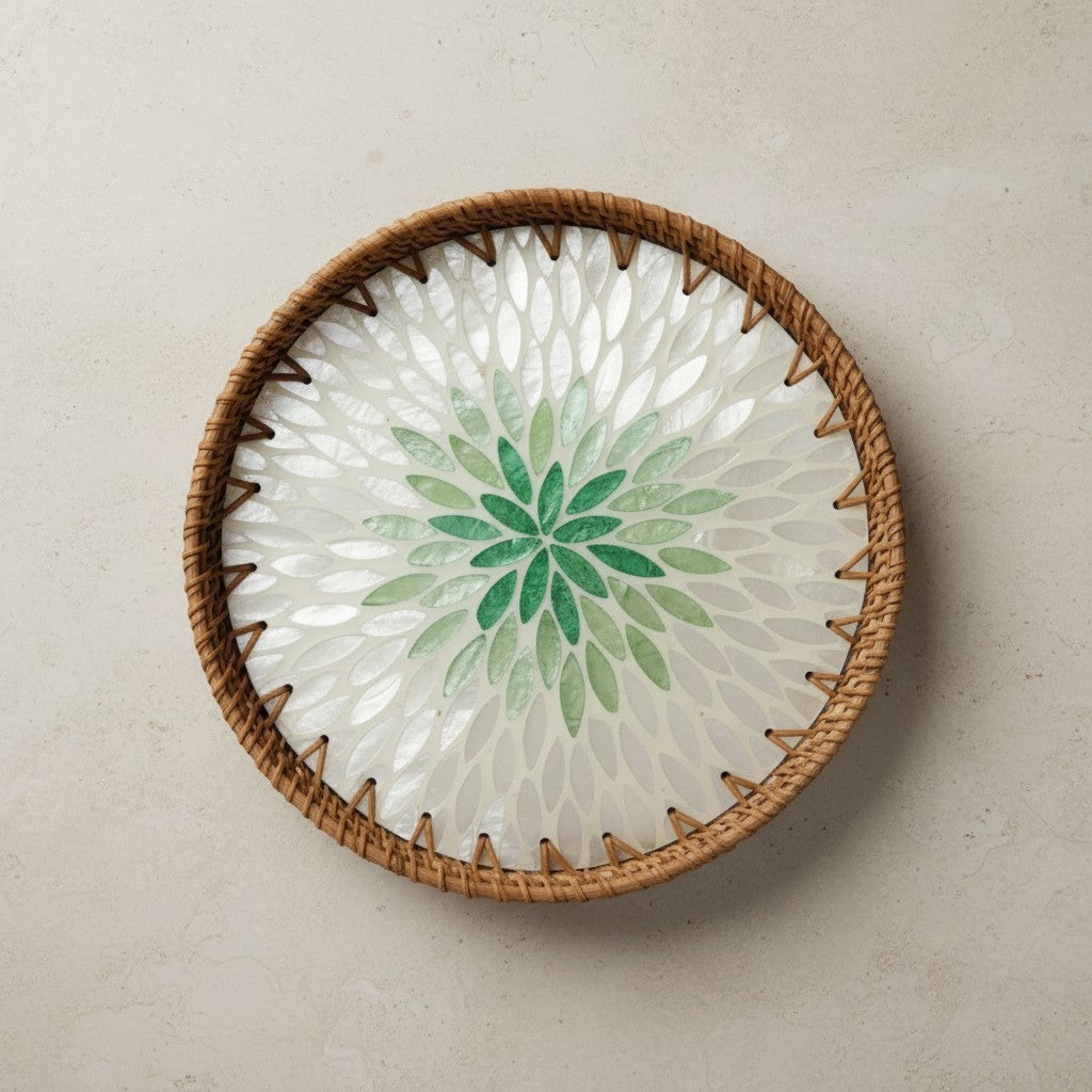 Emerald Petal round mother-of-pearl tray with rattan rim in top view