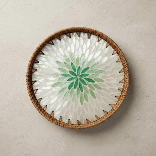 Emerald Petal round mother-of-pearl tray with rattan rim in top view