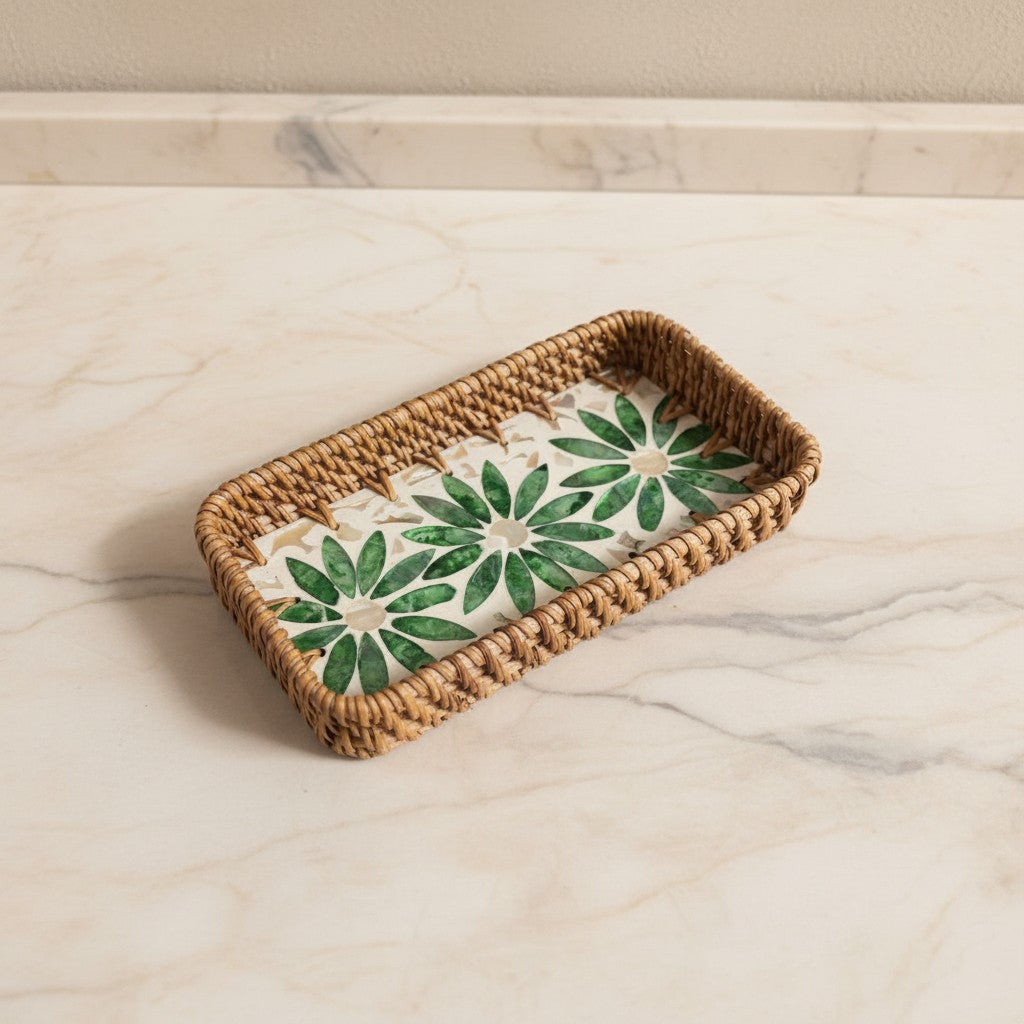 Green Daisy Vanity Tray with green floral mother-of-pearl inlay and woven rattan rim on a light marble surface