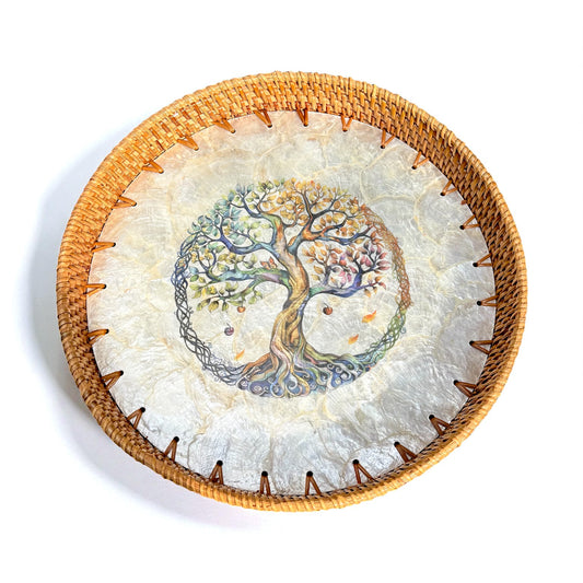 Round Tree of Life tray with mother-of-pearl mosaic and hand-woven rattan rim on white background