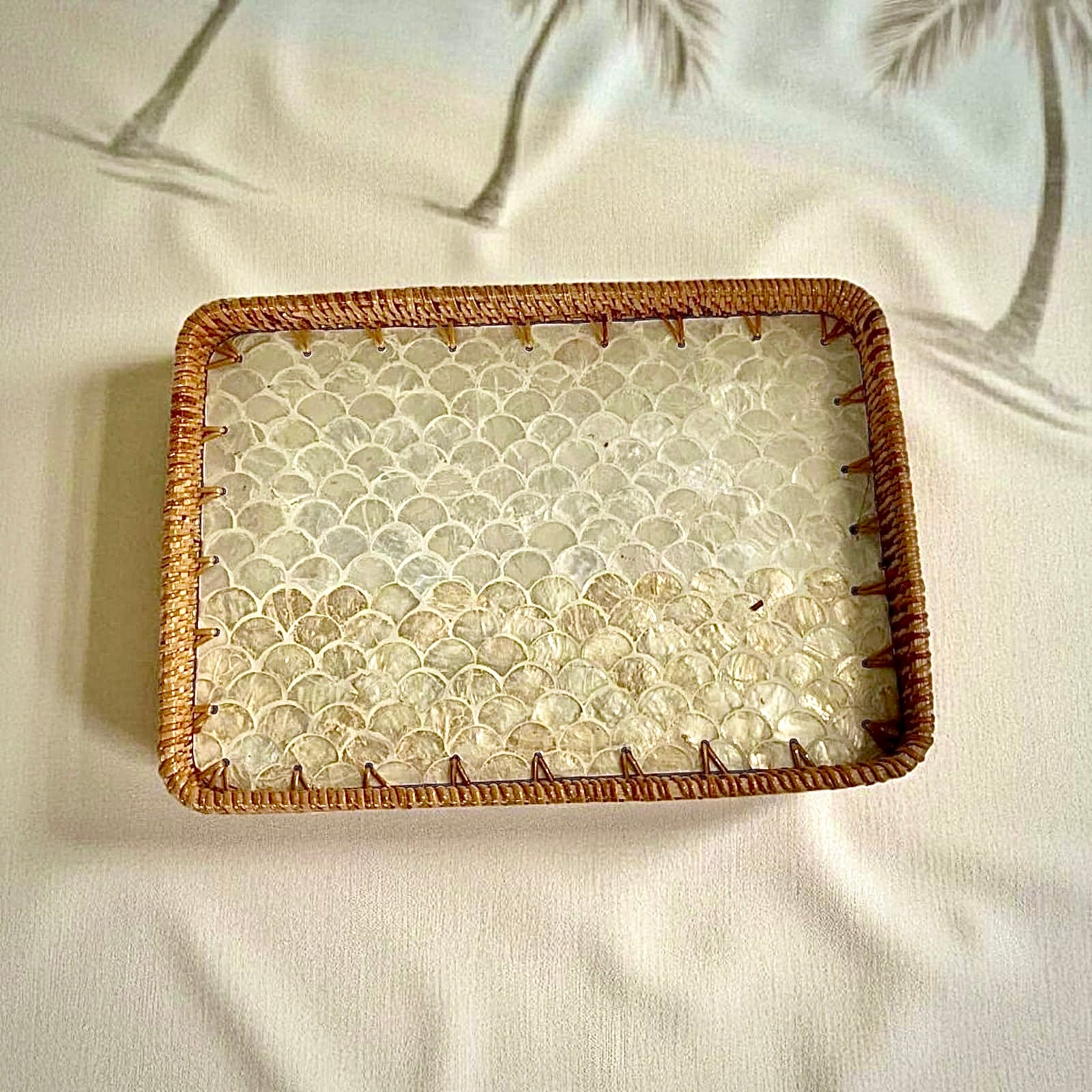 Overhead view of Coastal Pearl Rectangular Tray showing shell-pattern mother-of-pearl tiles