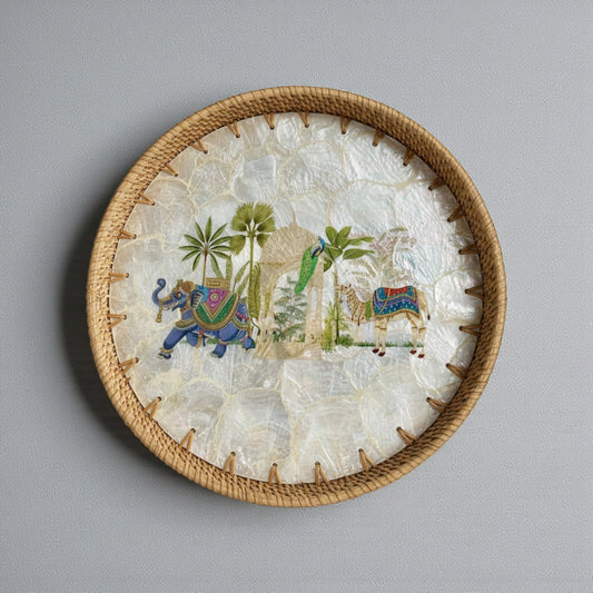 Round mother-of-pearl mosaic tray with hand-woven rattan rim — Royal Oasis motif (elephant, palms & camel)