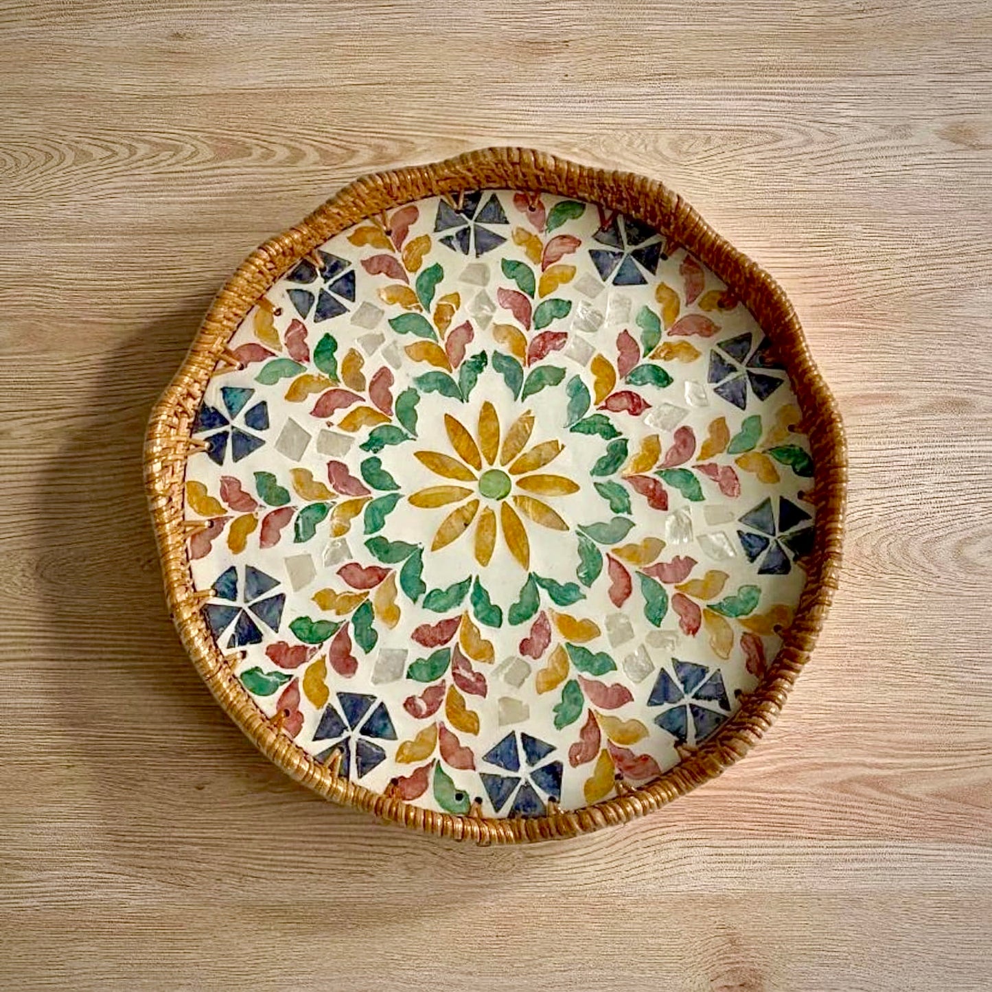 Blossom Scalloped Round Tray placed flat on a light wooden tabletop