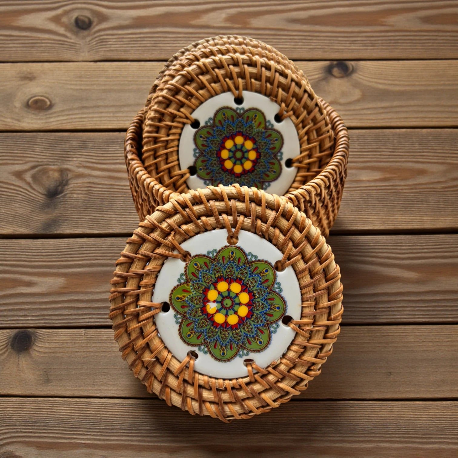 Meadow Mandala Ceramic Rattan Coasters on a wooden centre table background