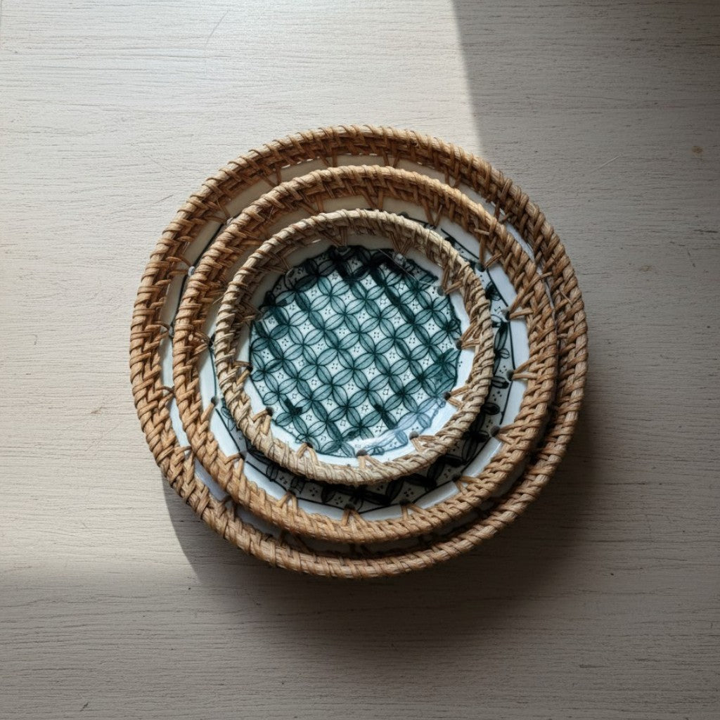 Midnight Bloom Set of 3 Ceramic Bowls with Rattan Rim On A Centra Table