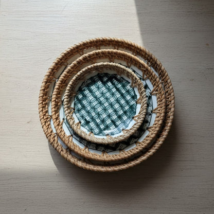 Midnight Bloom Set of 3 Ceramic Bowls with Rattan Rim On A Centra Table