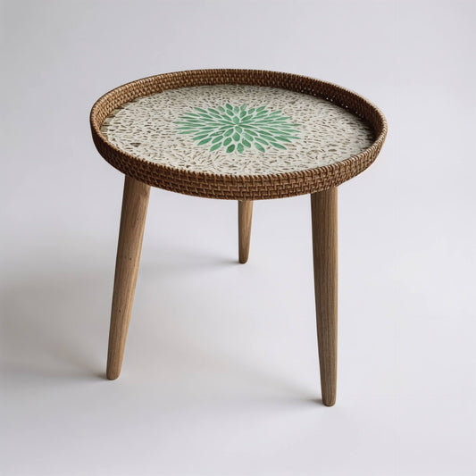 Round mother-of-pearl and rattan side table on white background