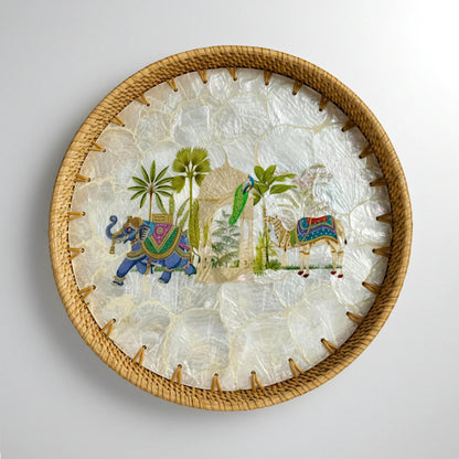 Round mother-of-pearl mosaic tray with hand-woven rattan rim — Royal Oasis motif (elephant, palms & camel)