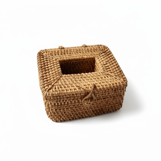 Square handwoven rattan tissue box cover on a white background