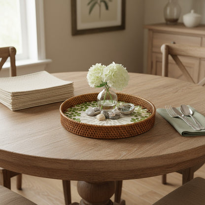 Round decorative tray for dining table with a small plant centerpiece – green mother-of-pearl mosaic.
