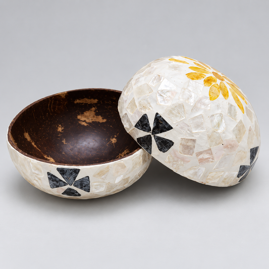 Floral Mosaic coconut bowl showing its dark interior and pearly floral exterior