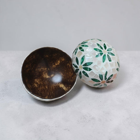 Green Daisy coconut bowl showing natural dark coconut interior and green floral mother-of-pearl exterior
