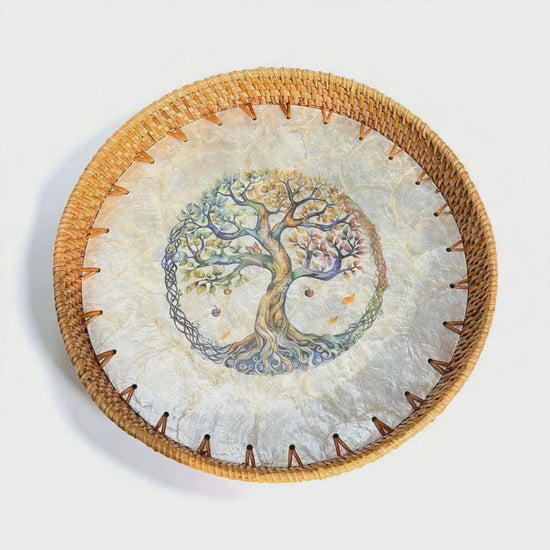 Video of Tree of Life round tray showing shine of mother-of-pearl and woven rattan